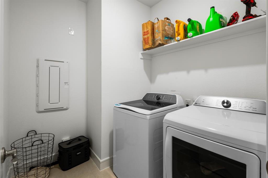 1926 Honey Crk Road Forney, TX 75126 - Photo 19 of 29 a utility room with dryer and washer