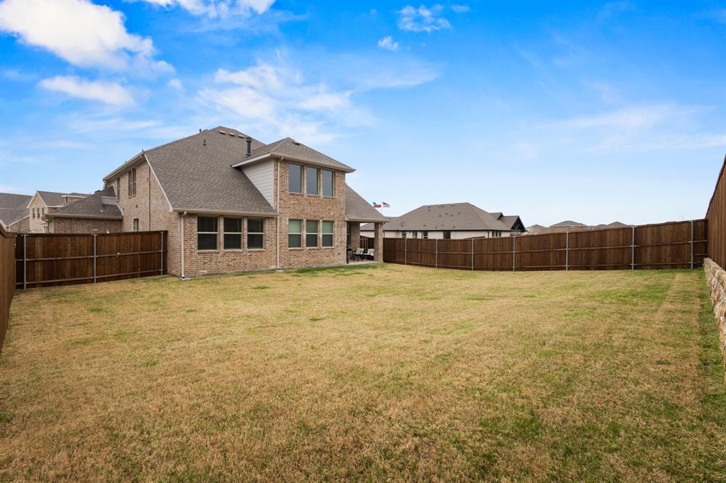 1926 Honey Crk Road Forney, TX 75126 - Photo 28 of 29 a front view of a house with a yard