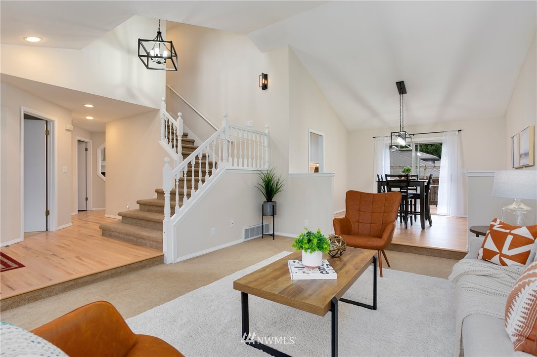 4521 244th Street Southeast Bothell, WA 98021 - Photo 2 of 38 a living room with furniture and wooden floor