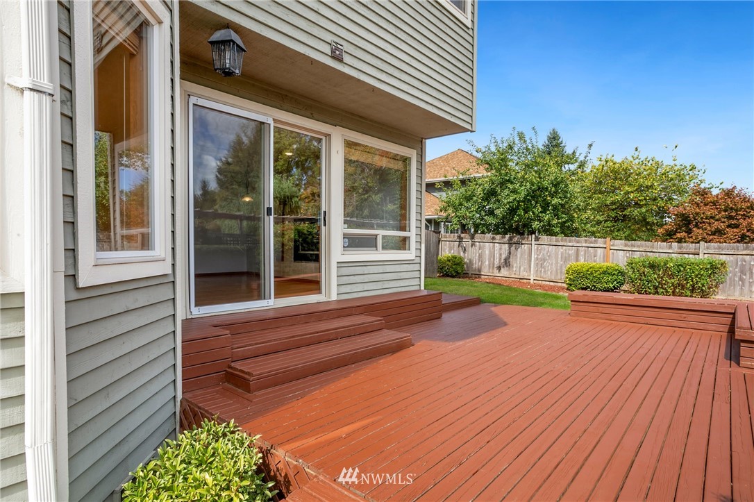 4521 244th Street Southeast Bothell, WA 98021 - Photo 23 of 38 a view of a house with a yard