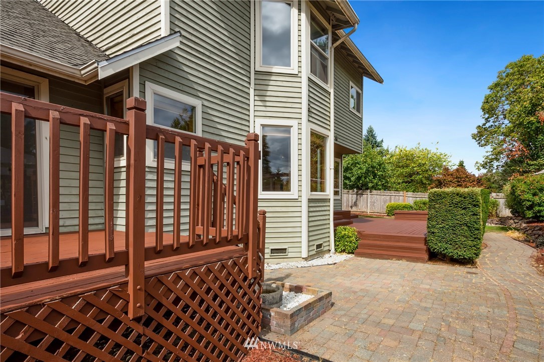 4521 244th Street Southeast Bothell, WA 98021 - Photo 26 of 38 a backyard of a house with wooden fence