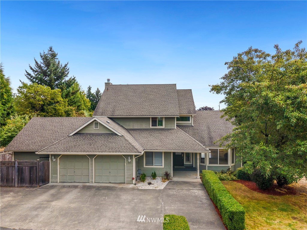 4521 244th Street Southeast Bothell, WA 98021 - Photo 27 of 38 a house view with a garden space