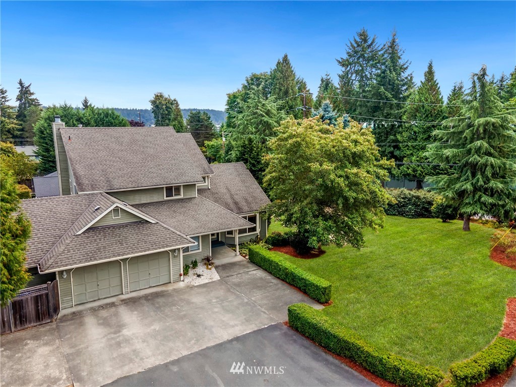 4521 244th Street Southeast Bothell, WA 98021 - Photo 36 of 38 an aerial view of a house with garden space and street view