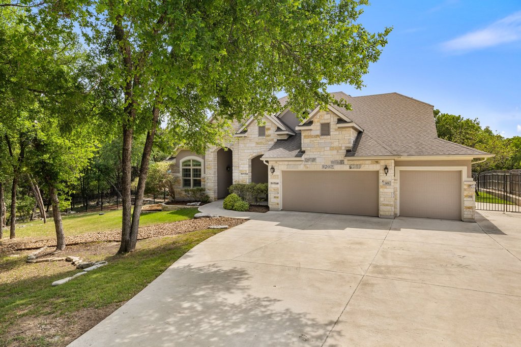 108 Berry Cove Georgetown, TX 78628 - Photo 39 of 39 a view of a white house with a yard and large tree