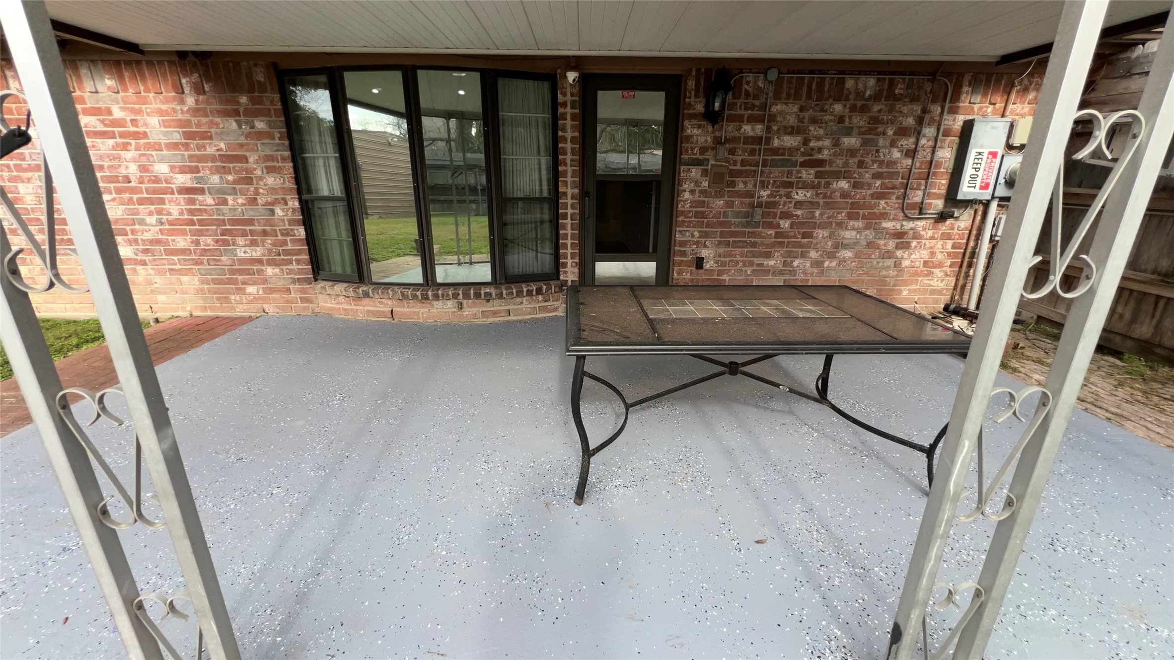 6615 Deer Ridge Lane Houston, TX 77086 - Photo 20 of 38 a living room with a floor to ceiling window and hardwood floor
