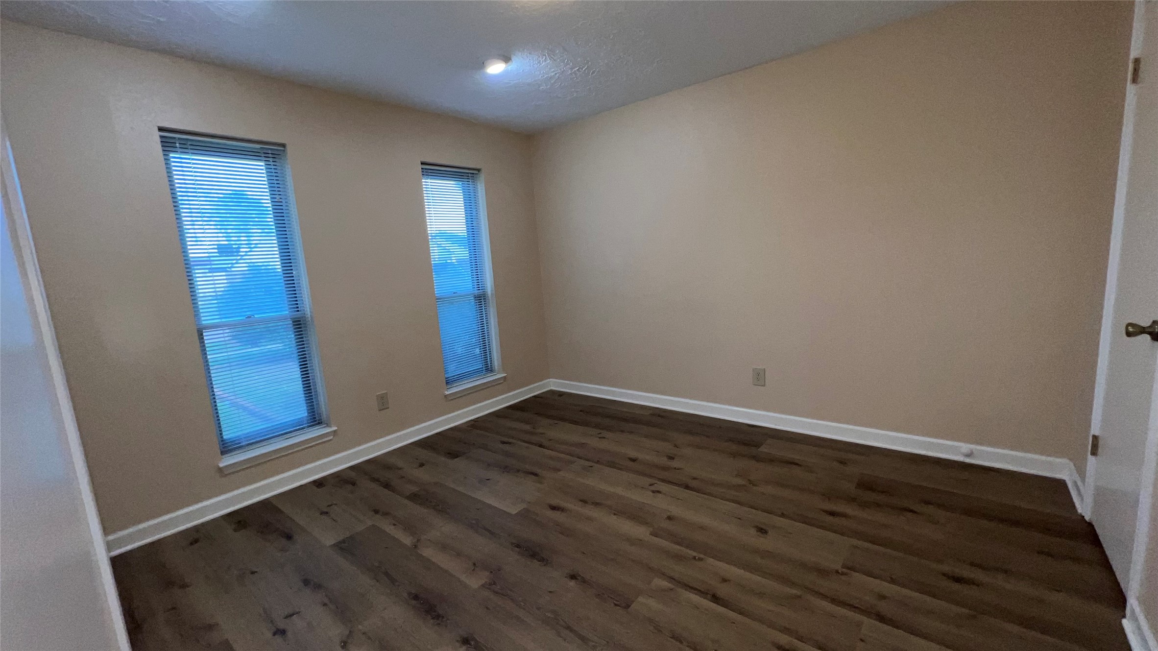 6615 Deer Ridge Lane Houston, TX 77086 - Photo 22 of 38 a view of empty room with wooden floor