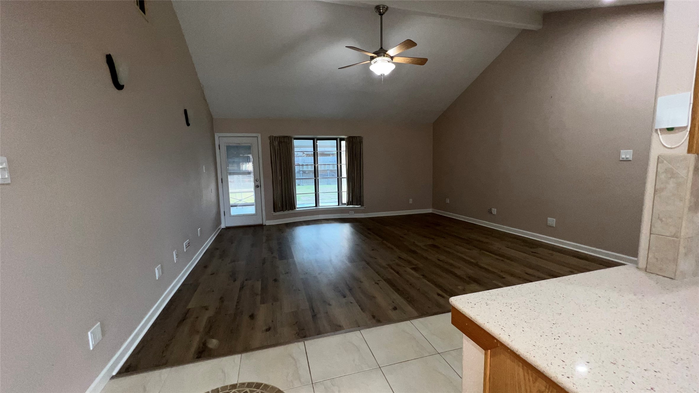 6615 Deer Ridge Lane Houston, TX 77086 - Photo 26 of 38 wooden floor in an empty room with a window