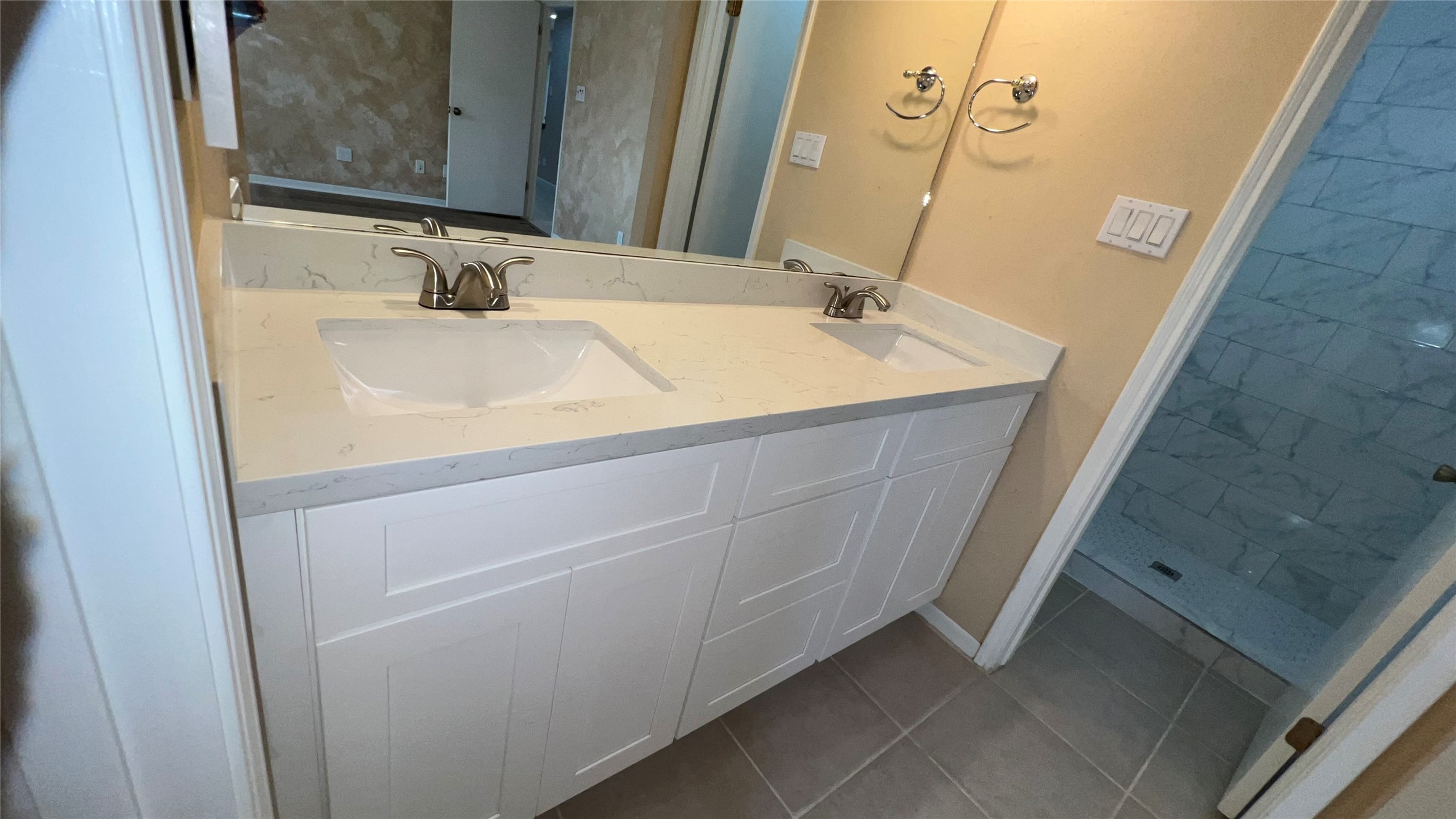 6615 Deer Ridge Lane Houston, TX 77086 - Photo 30 of 38 a bathroom with a sink and a mirror