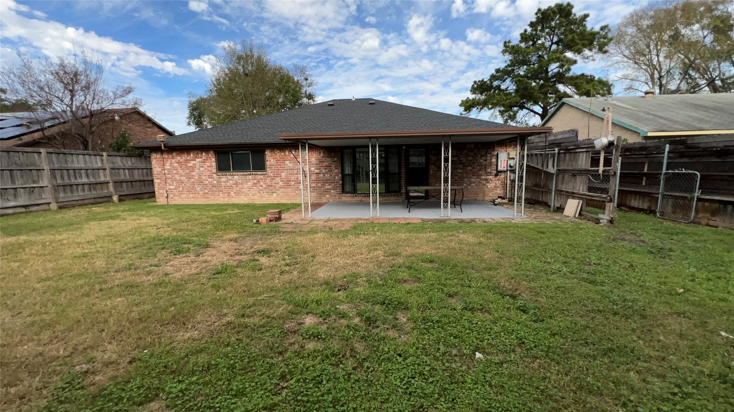 6615 Deer Ridge Lane Houston, TX 77086 - Photo 32 of 38 a view of a house with a yard and sitting area
