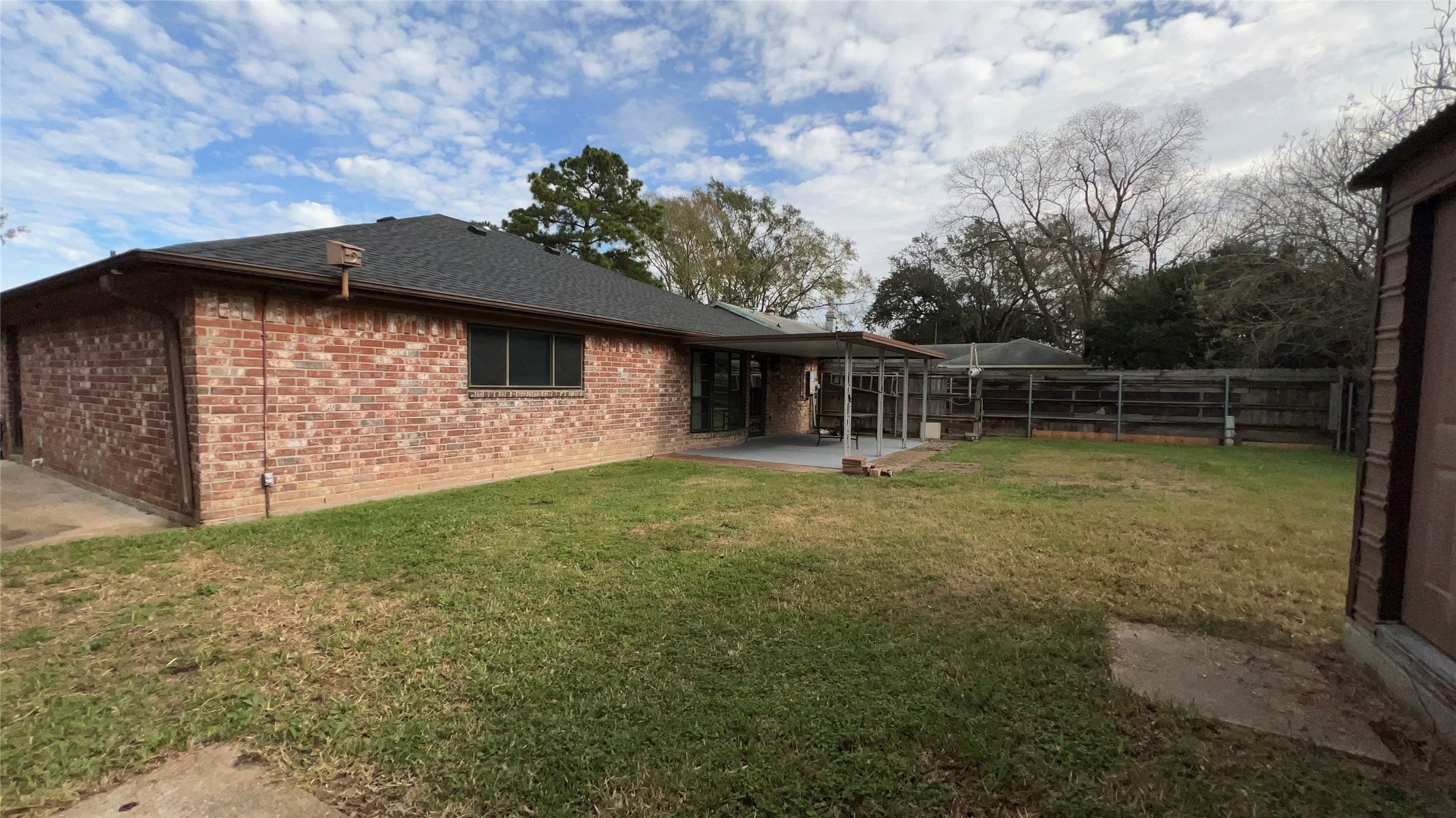 6615 Deer Ridge Lane Houston, TX 77086 - Photo 34 of 38 a backyard of a house with lots of green space