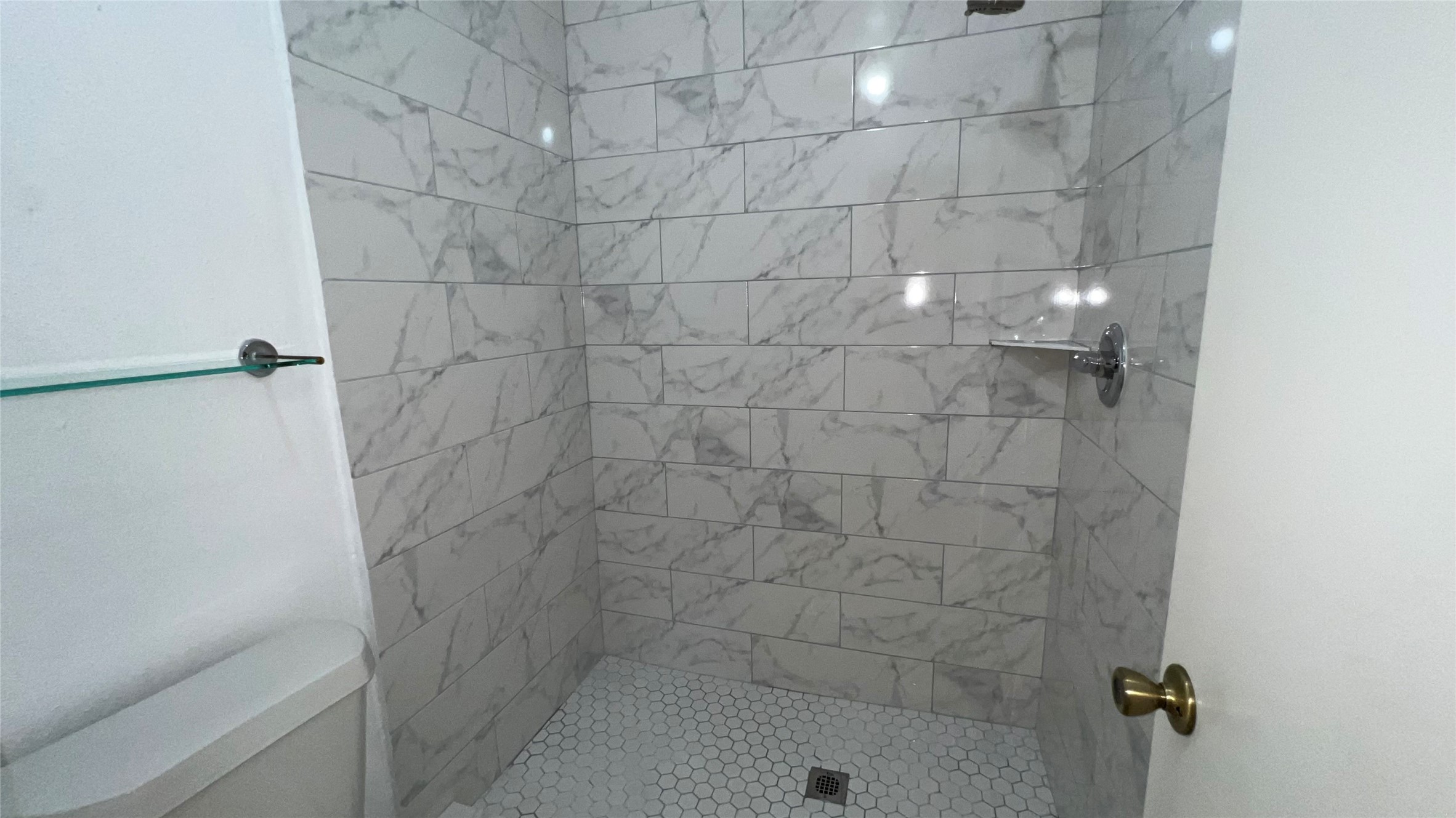 6615 Deer Ridge Lane Houston, TX 77086 - Photo 38 of 38 a bathroom with a shower