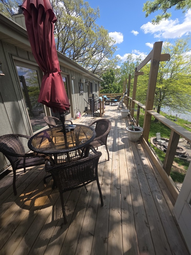 107 Comanche Trail Loda, IL 60948 - Photo 33 of 37 a view of outdoor space yard deck patio and outdoor seating