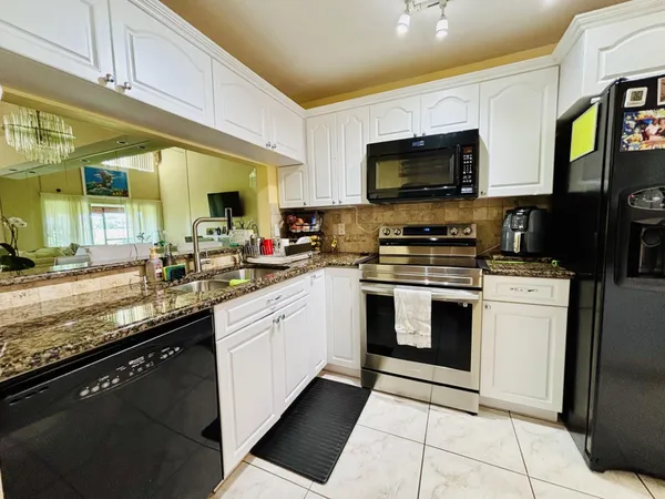 $420,000 | 7426 Pinewalk Drive South, Unit 7426, Margate, FL 33063