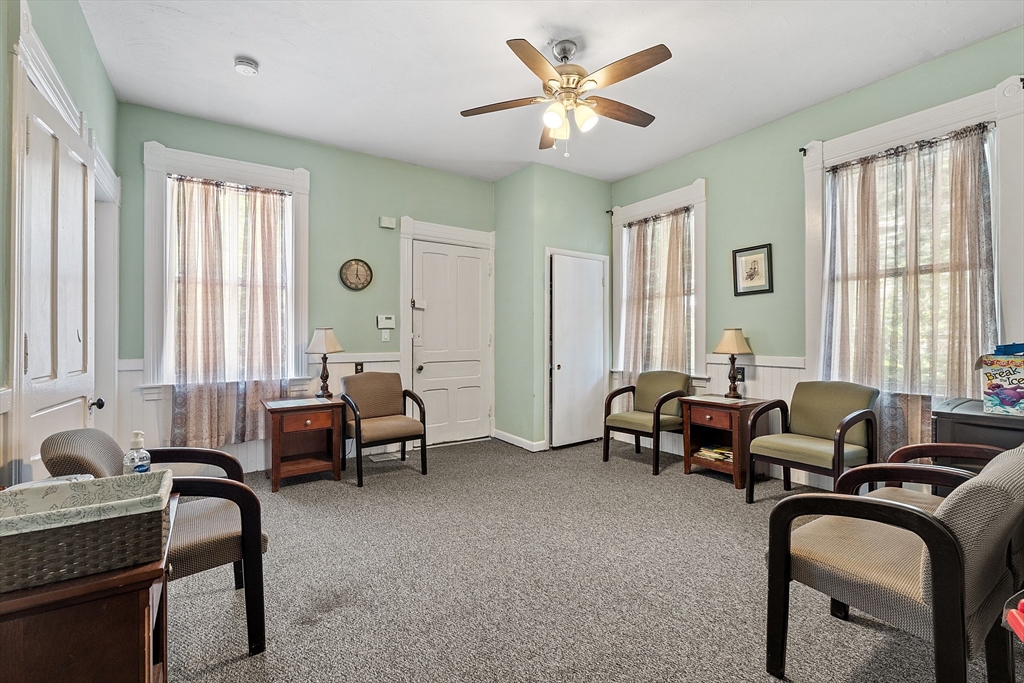 52 Cedar Street Worcester, MA 01609 - Photo 14 of 36 a living room with furniture and window