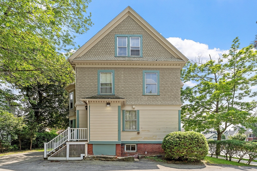 52 Cedar Street Worcester, MA 01609 - Photo 2 of 36 a view of a house with a yard