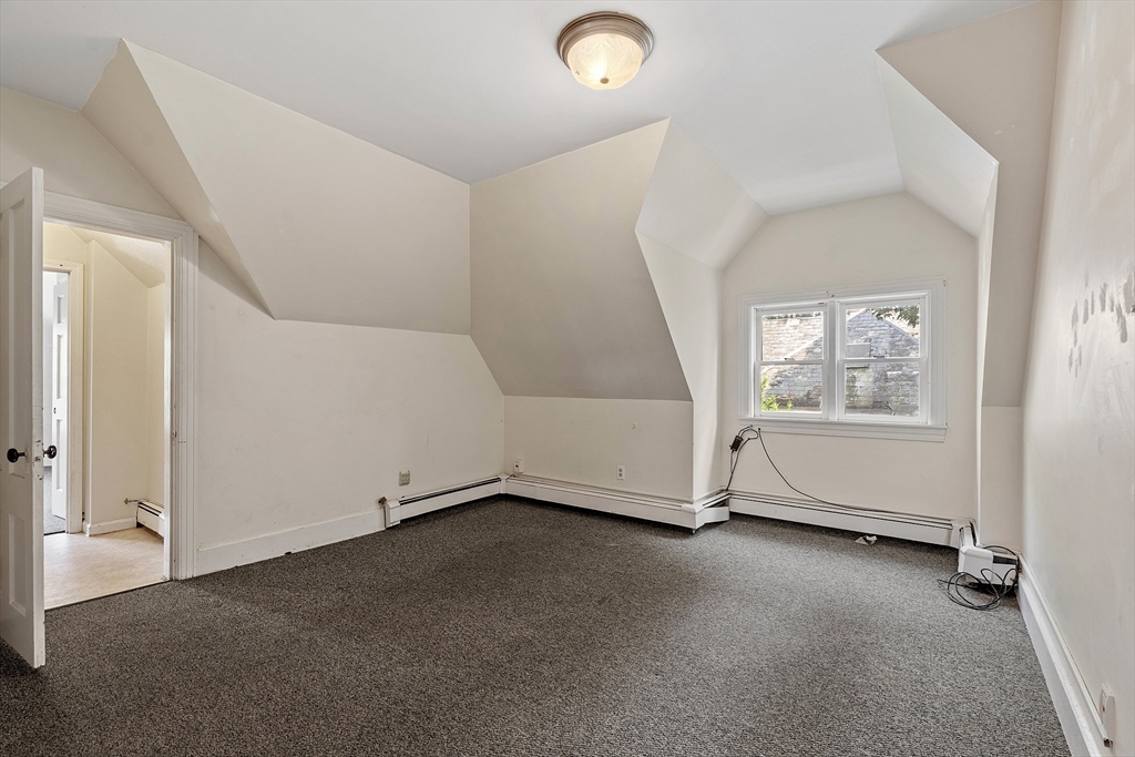 52 Cedar Street Worcester, MA 01609 - Photo 23 of 36 an empty room with windows