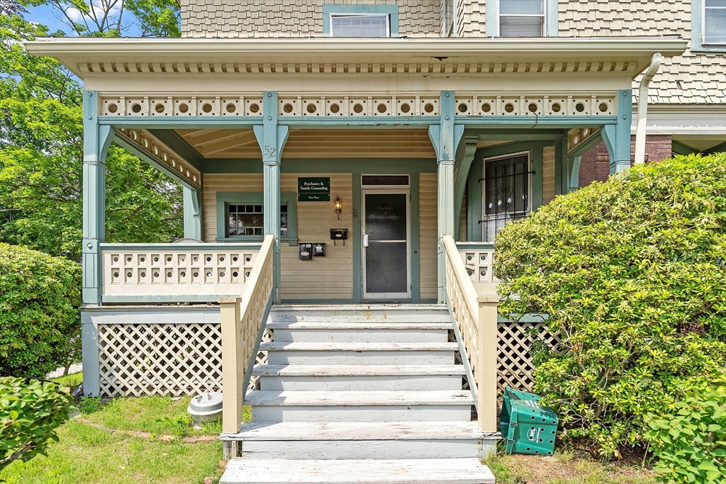 52 Cedar Street Worcester, MA 01609 - Photo 4 of 36 a view of a building with entryway