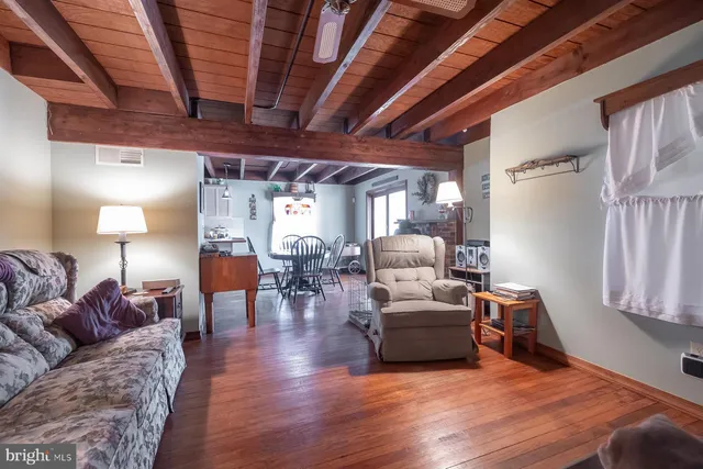 a kitchen with counter top space a sink and appliances