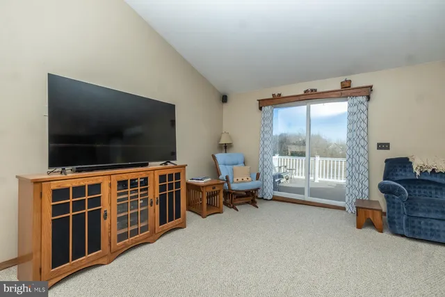 a bathroom with a sink double vanity and a mirror