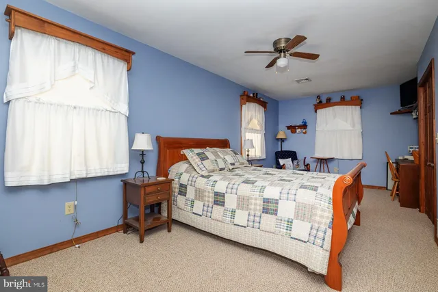 a view of a car park in front of house