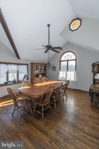a kitchen with stainless steel appliances granite countertop a stove a sink dishwasher and a refrigerator