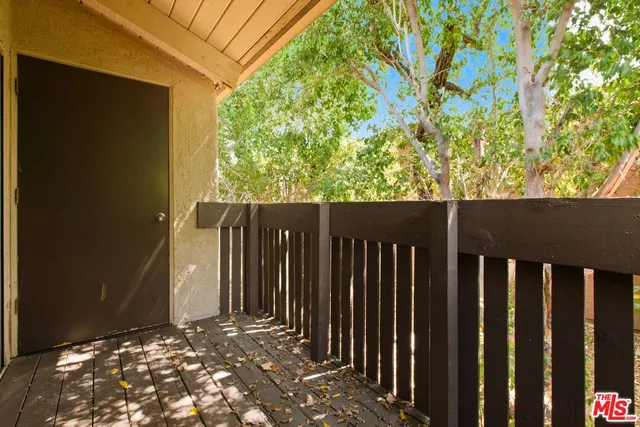 a view of a wooden fence
