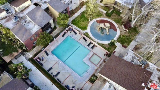 an aerial view of a house with a garden