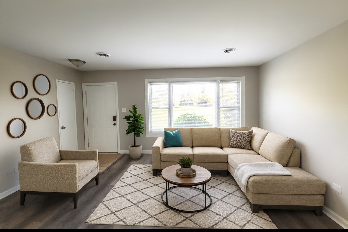 111 East 13th Street Lombard, IL 60148 - Photo 15 of 24 a living room with furniture and a window
