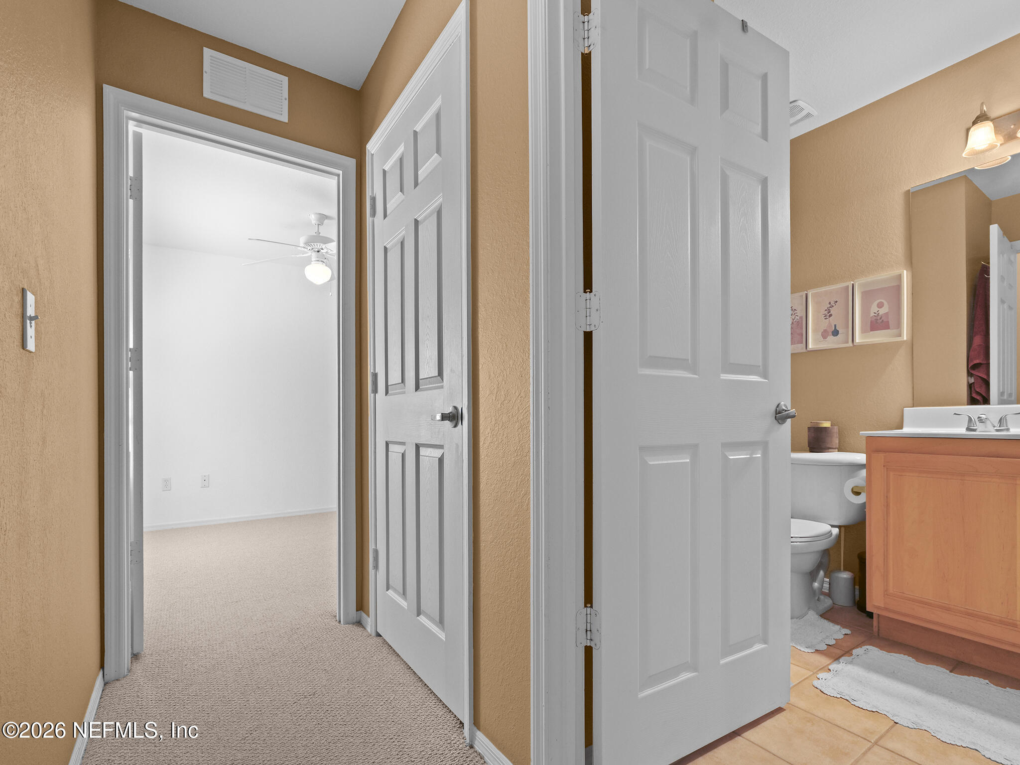 712 Lighthouse Road, Unit 712 Panama City Beach, FL 32407 - Photo 15 of 42 a view of a bathroom from a hallway