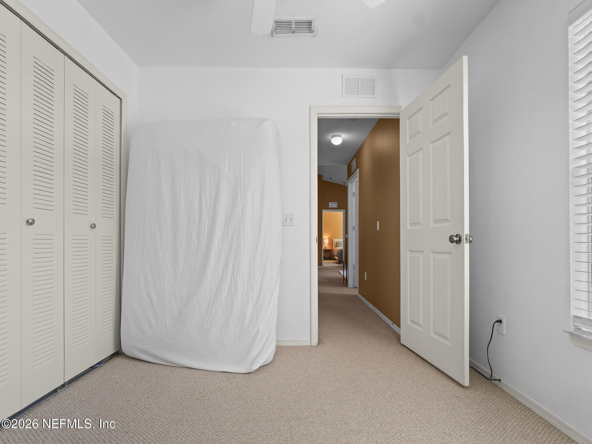 712 Lighthouse Road, Unit 712 Panama City Beach, FL 32407 - Photo 29 of 42 a view of a room with a hallway