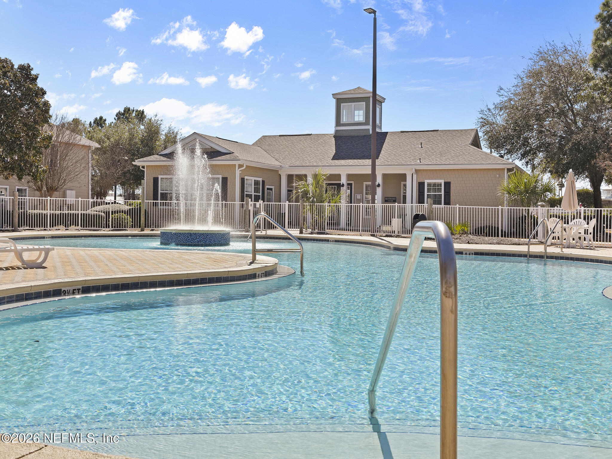 712 Lighthouse Road, Unit 712 Panama City Beach, FL 32407 - Photo 39 of 42 a front view of a house with a yard