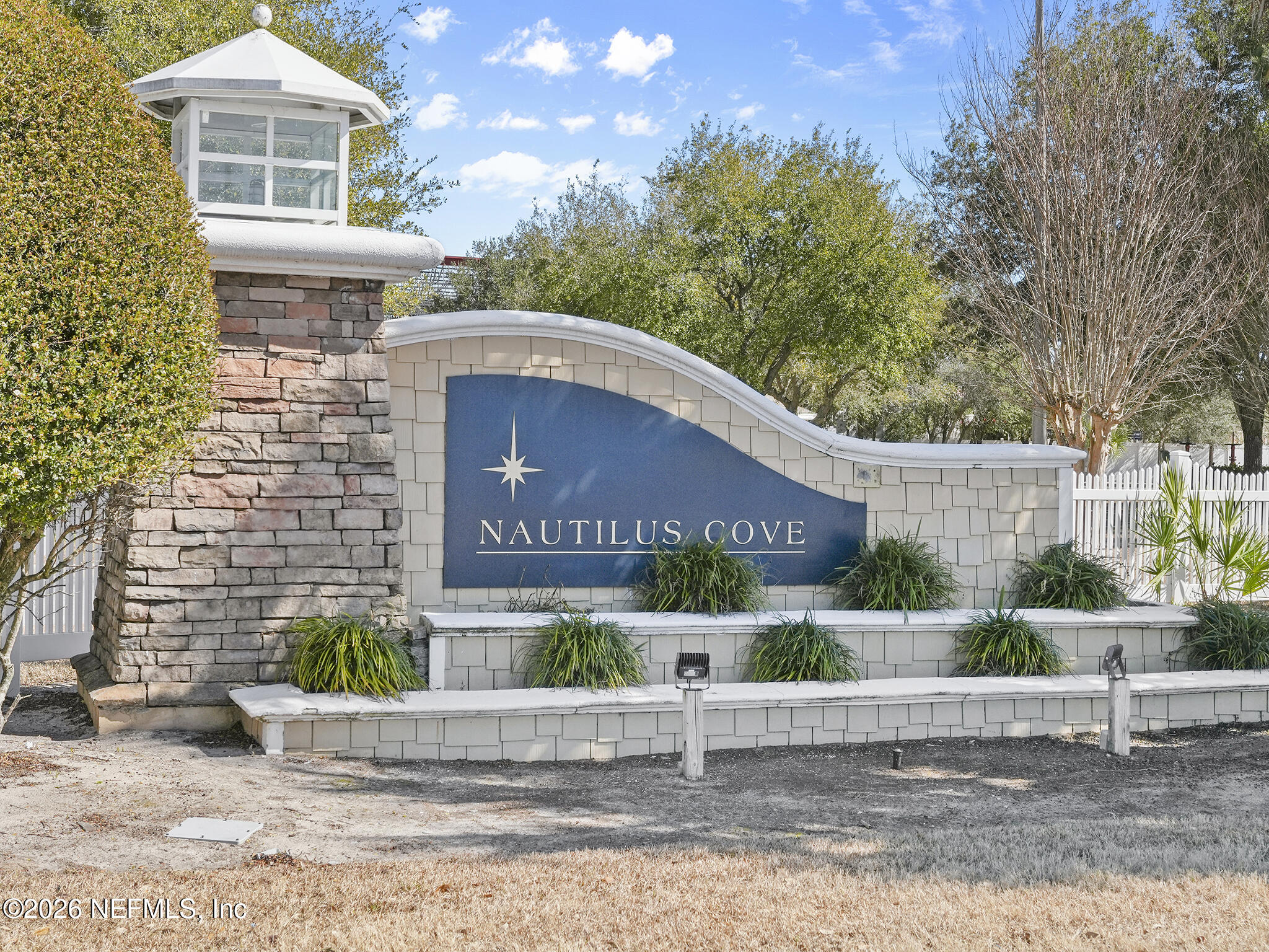 712 Lighthouse Road, Unit 712 Panama City Beach, FL 32407 - Photo 42 of 42 a front view of a house with garden