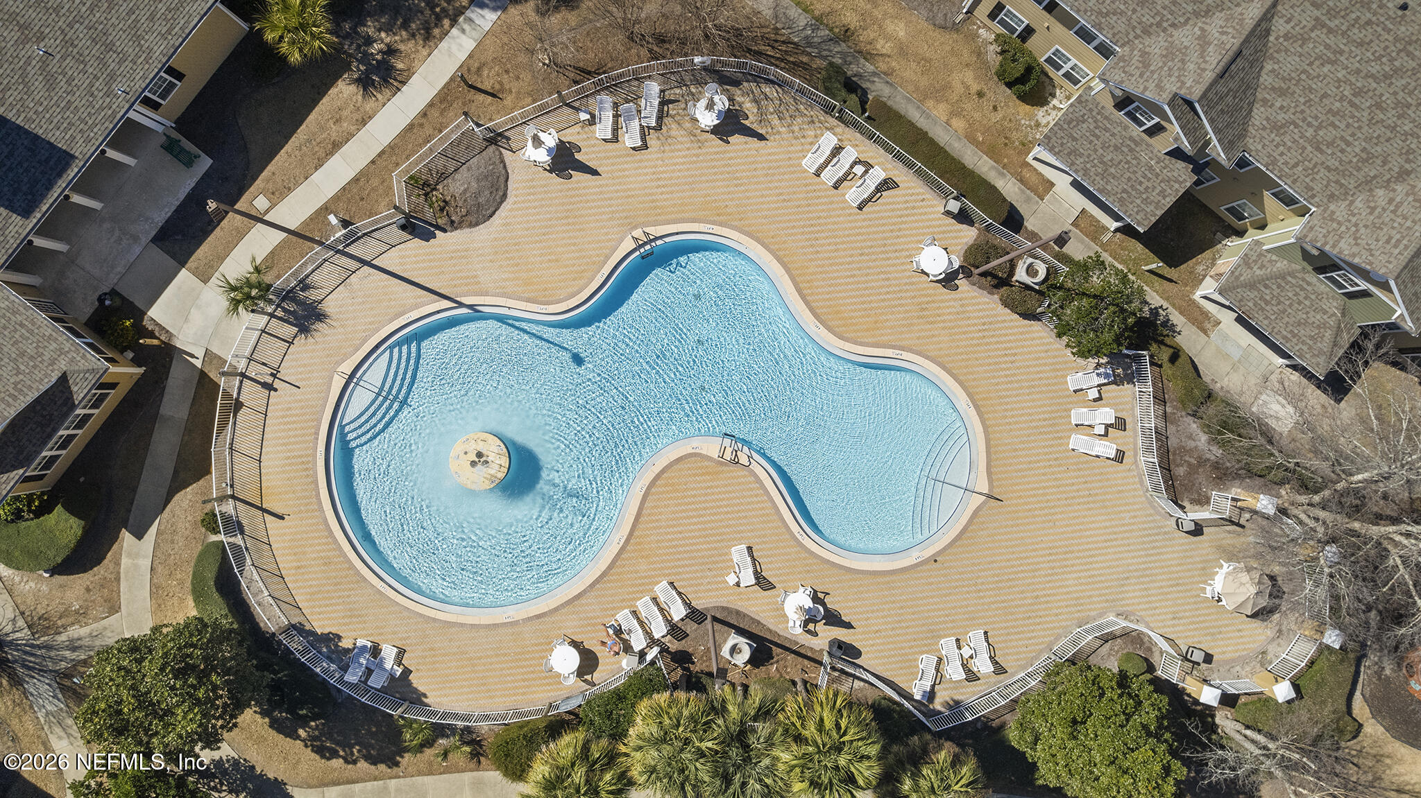 712 Lighthouse Road, Unit 712 Panama City Beach, FL 32407 - Photo 9 of 42 an aerial view of a swimming pool