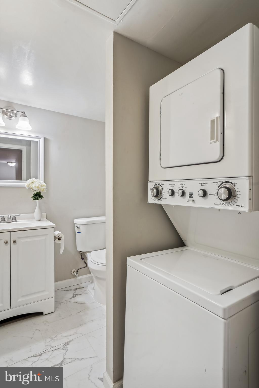 17817 Buehler Road, Unit 96 Olney, MD 20832 - Photo 23 of 38 a utility room with dryer and washer