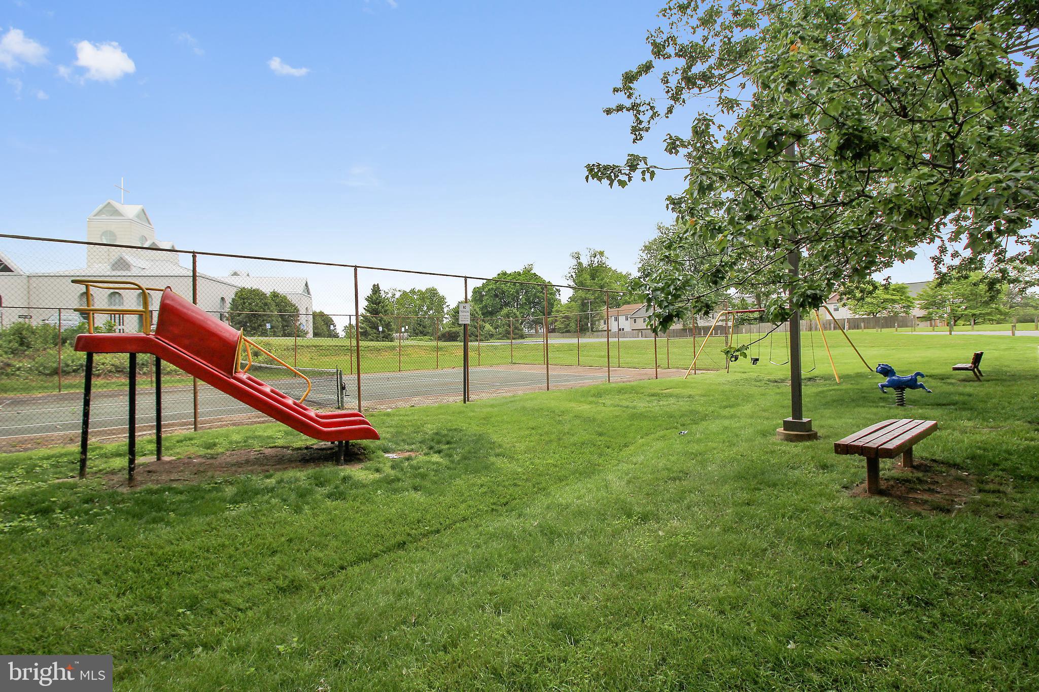 17817 Buehler Road, Unit 96 Olney, MD 20832 - Photo 29 of 38 a view of a park with swings