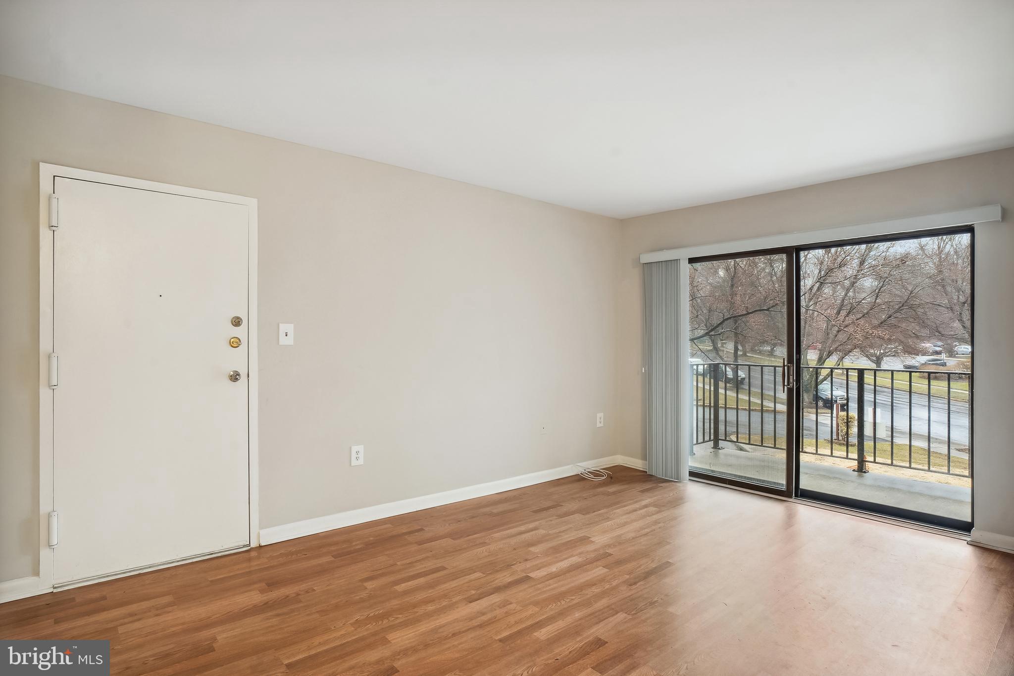 17817 Buehler Road, Unit 96 Olney, MD 20832 - Photo 10 of 38 wooden floor in an empty room with a window