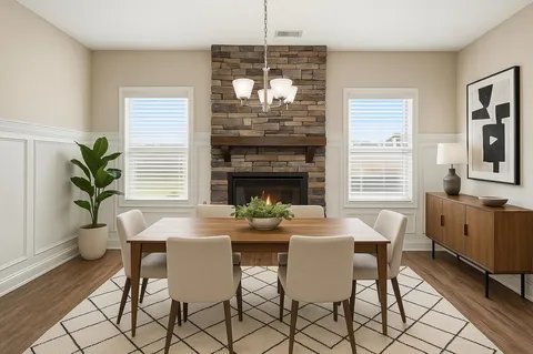 a dining room with furniture a livingroom and chandelier