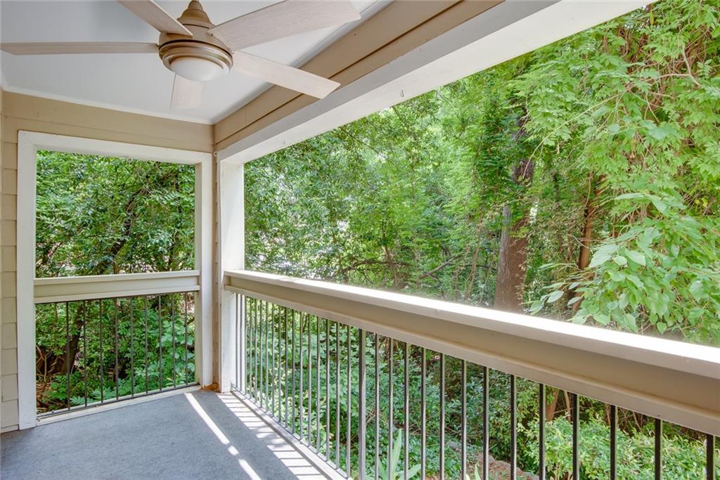 591 Emory Oaks Way, Unit 591 Decatur, GA 30033 - Photo 32 of 33 a view of a balcony with roof