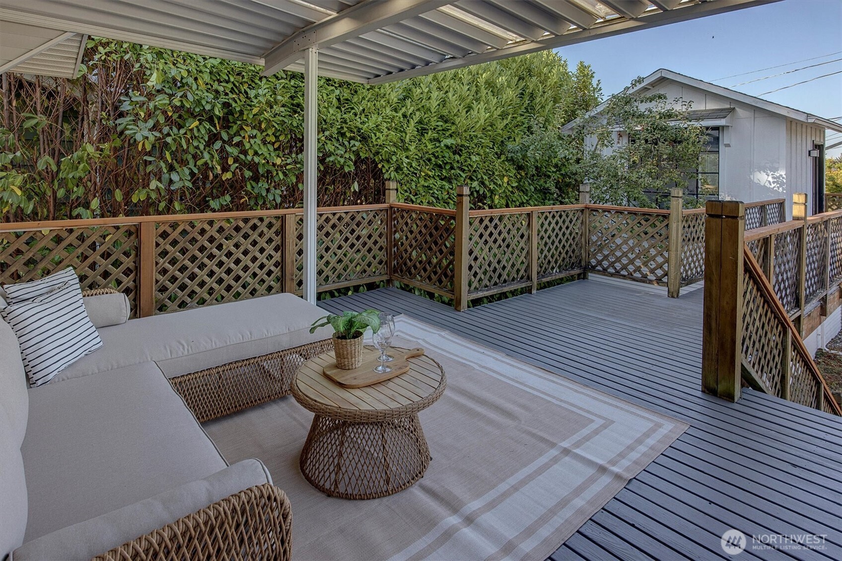 6021 45th Avenue Southwest Seattle, WA 98136 - Photo 11 of 18 a view of a porch with furniture