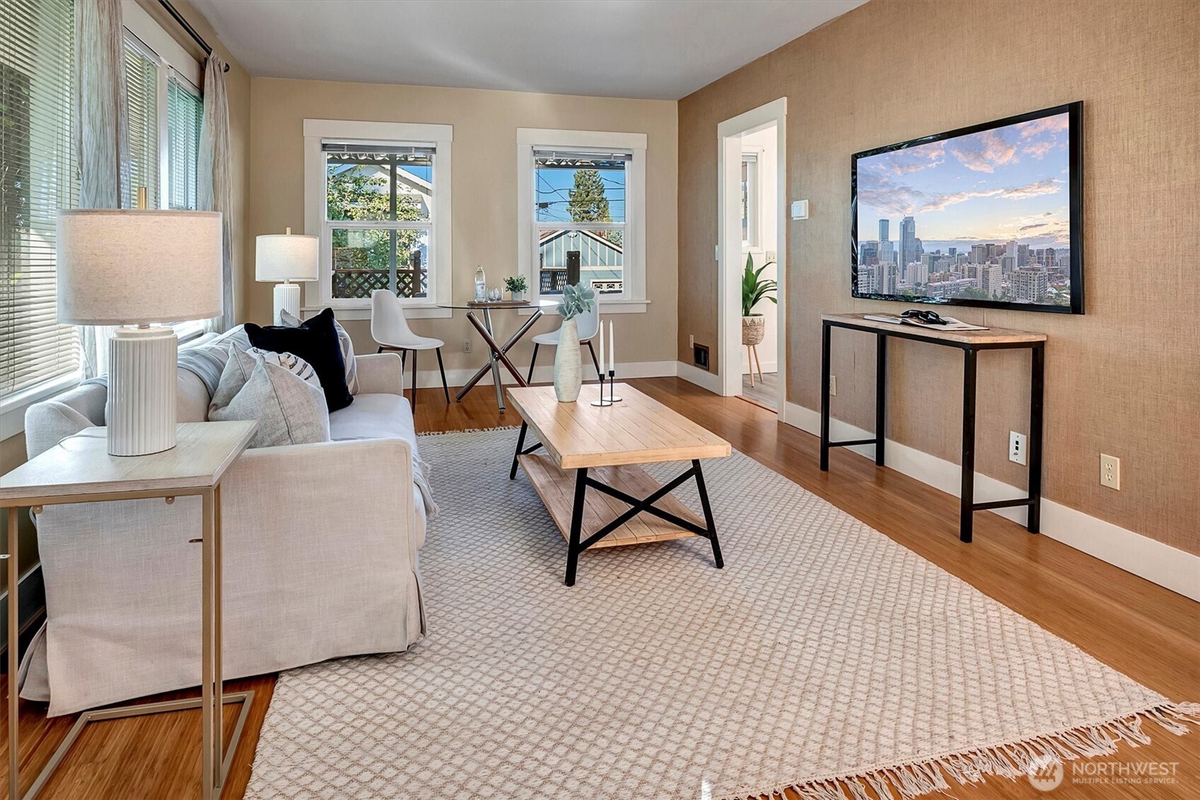 6021 45th Avenue Southwest Seattle, WA 98136 - Photo 2 of 18 a living room with furniture and a window