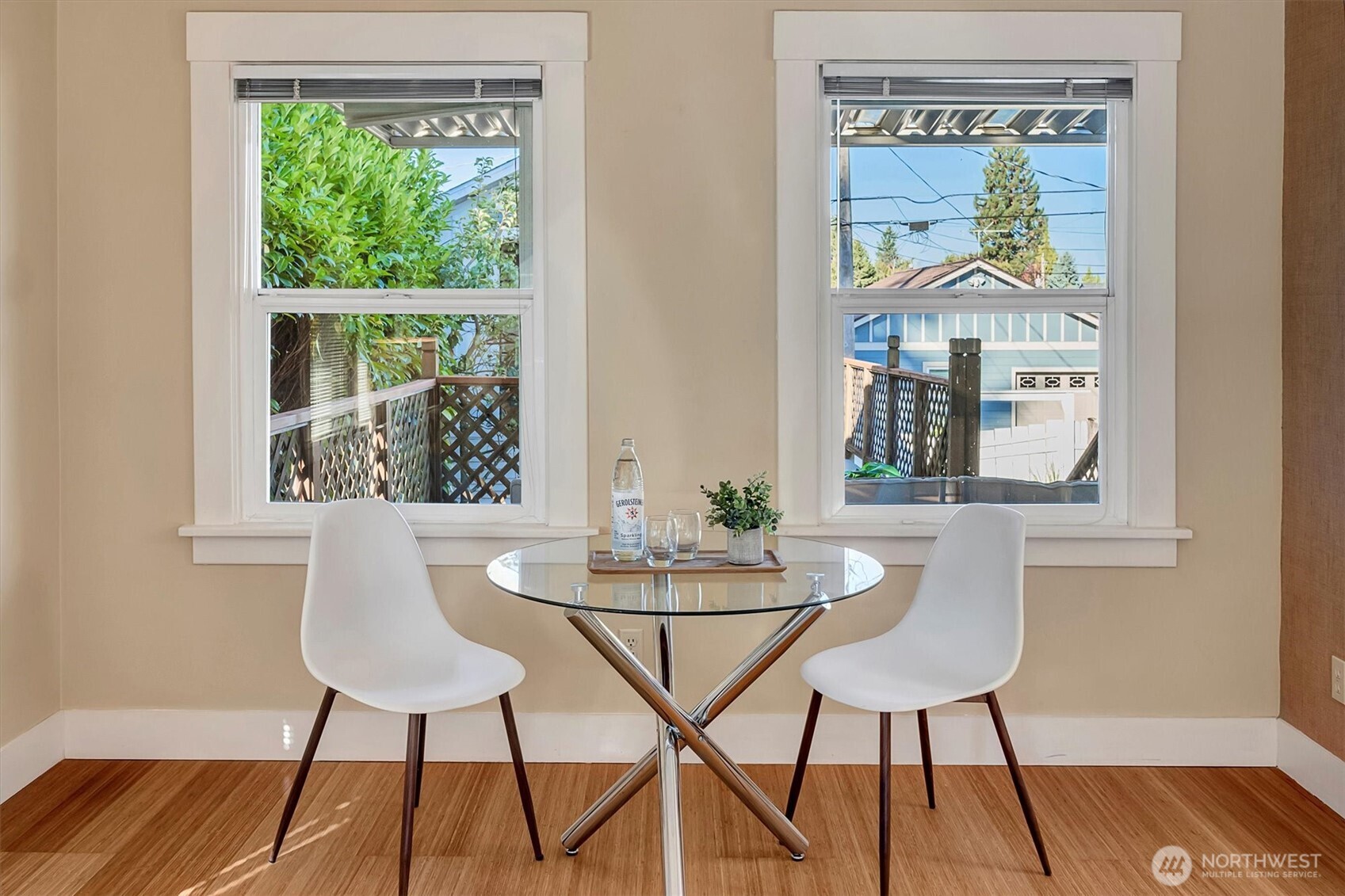 6021 45th Avenue Southwest Seattle, WA 98136 - Photo 5 of 18 a view of a dining room with furniture window and wooden floor