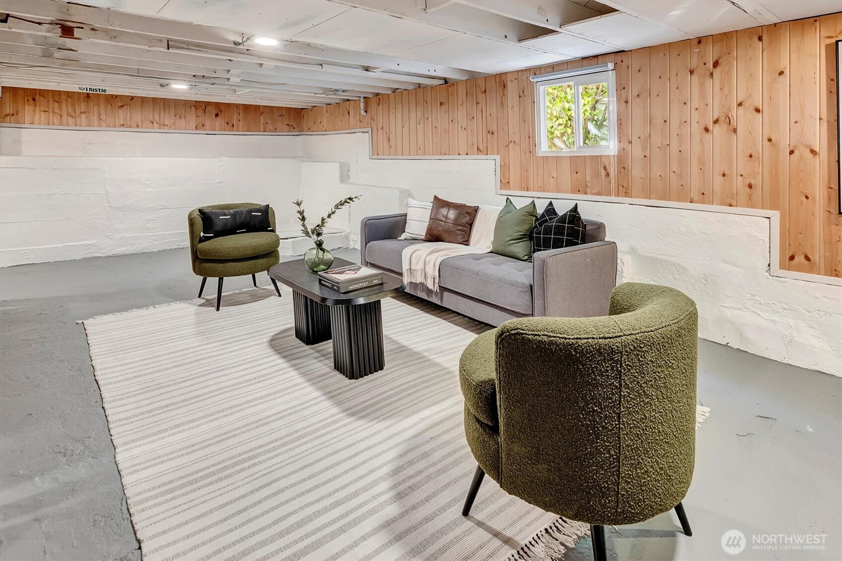 6021 45th Avenue Southwest Seattle, WA 98136 - Photo 10 of 18 a living room with furniture and a wooden floor
