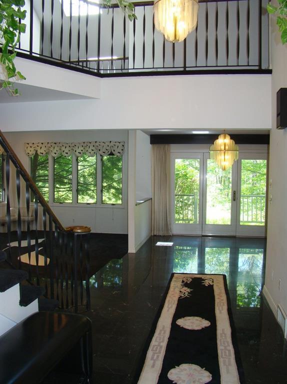 186 Cedarwood Road Auburn, ME 04210 - Photo 7 of 35 Marble entry to dining room