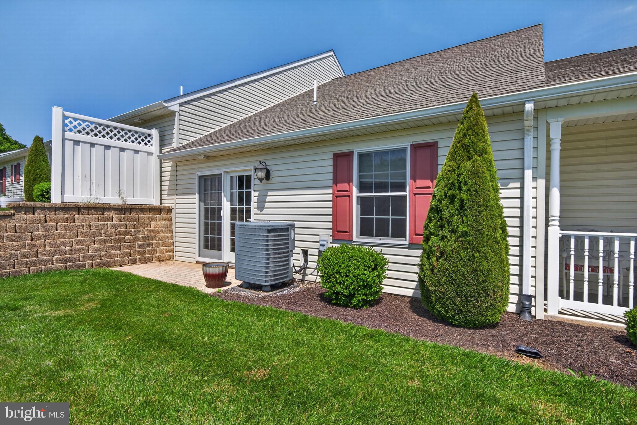 1332 Pleasant View Drive, Unit 75 Spring Grove, PA 17362 - Photo 25 of 26 front view of a house with a yard