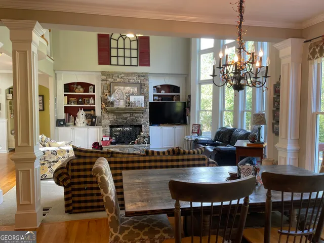 a bedroom with a bed dresser and a window