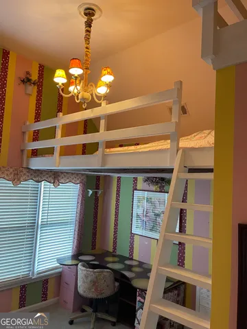 a bathroom with a toilet a sink a glass door a shower and mirror