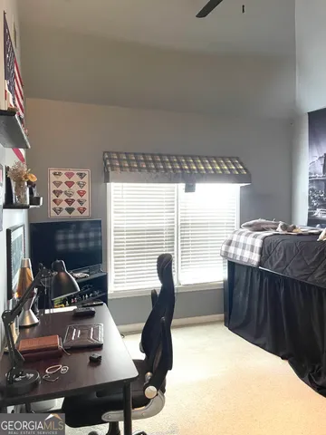 a view of a chairs and table in the patio