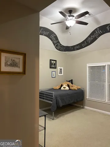 a view of a chairs and table in the yard