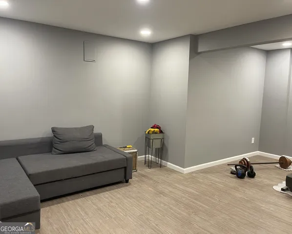 a view of a building with a small yard and plants