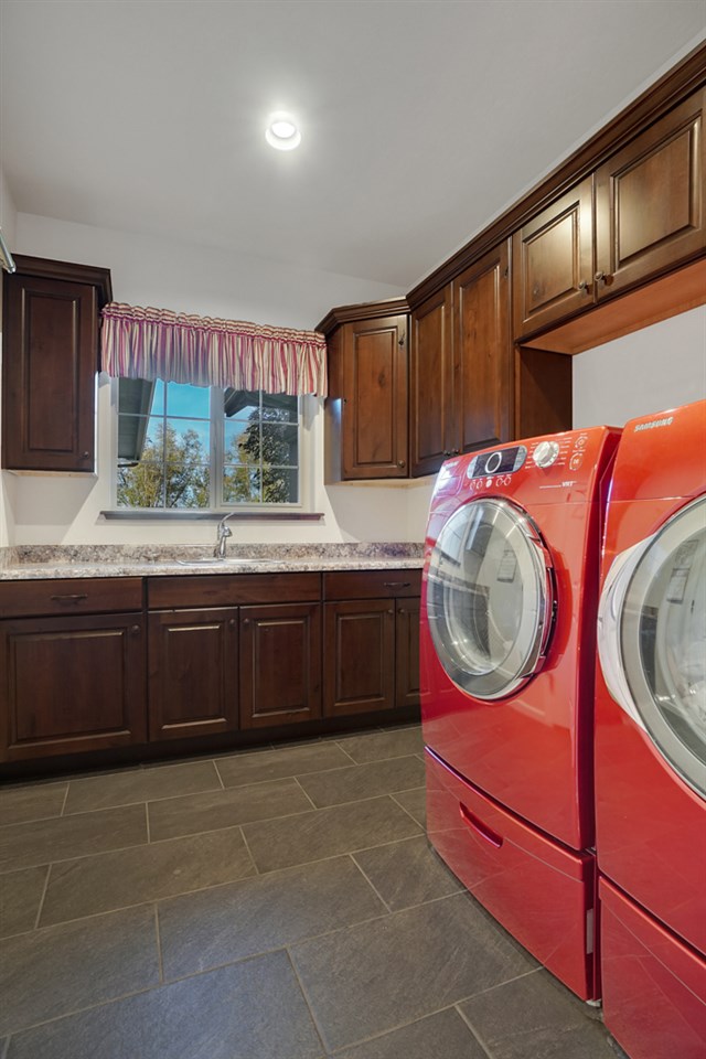 1937 Interstate 70 Frontage Road Fruita, CO 81521 - Photo 24 of 42 a kitchen with stainless steel appliances granite countertop a stove a sink and a microwave